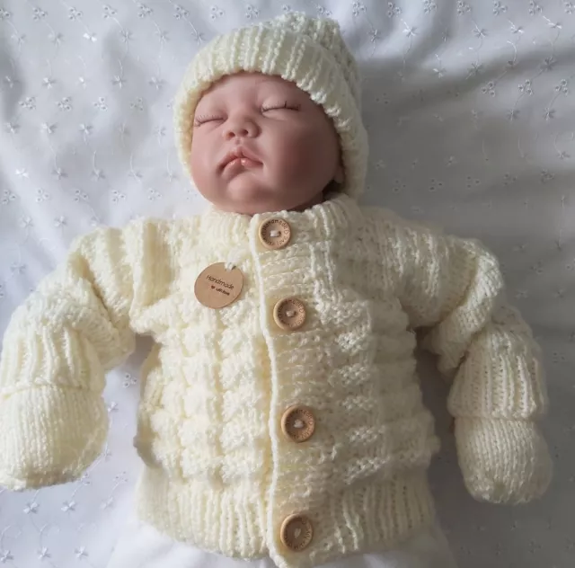Hand knitted  Aran  Cardigan, hat and mittens set 0-3 month in Colour  Cream