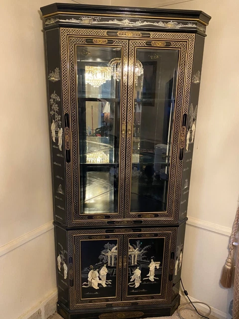 Oriental Lighted Corner Curio Cabinet Oriental Lighted Corner Curio Cabinet