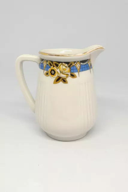 Grand sucrier et pot à lait en Porcelaine de Limoges à décor fleuri
