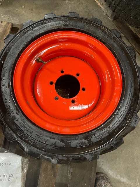 26x12D380 OTR Outrigger Foam Filled Tire & Wheel.  167313, 167312