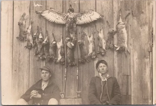 c1910s RPPC Real Photo Postcard Hunters Dead Bird and Rabbits on Wall *Trimmed