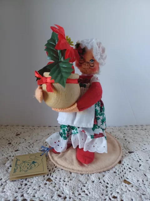 1994 Vintage Annalee Doll Mrs Claus holding Poinsettia Plant 8"