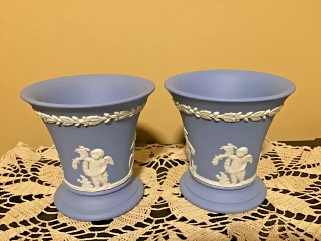 Pair Wedgwood blue Jasper ware vases Classic design cherubs oak garland