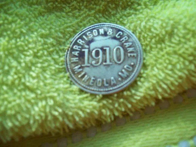 1910 HARRISON & CRANE  - Mineola Missouri  25 Cent Trade Token