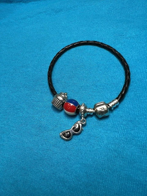 Authentic Pandora 7" leather bracelet with 3 sterling silver charms