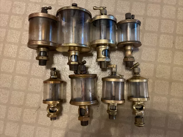 Antique Brass Hit and Miss Engine Oilers collection of 8