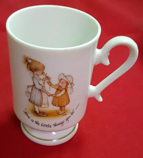 Holly Hobbie 1973 Mug. "Love is The Little Things You Do" Mint Condition.