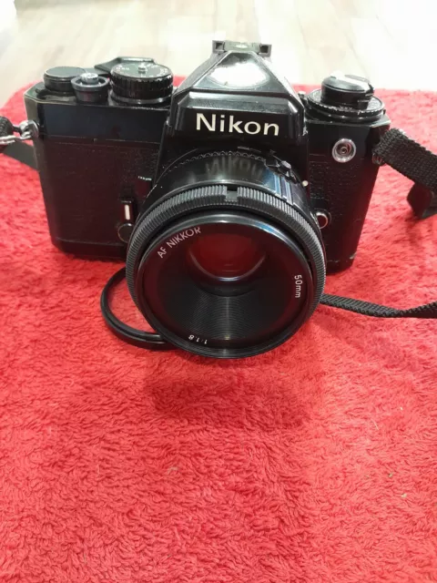 Nikon FE 35mm Film SLR Manual Camera with 50mm F/1.8 NIKKOR AF Lens