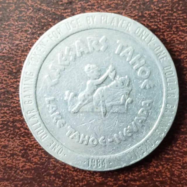 One (1) 1984 Caesars Tahoe One Dollar Gaming Token, Nevada