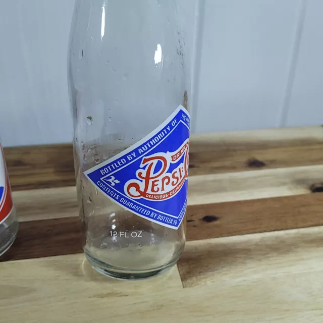 Lot of Two VINTAGE Clear Glass Pepsi Cola Bottles 12oz Double Logo Embossed Body 2