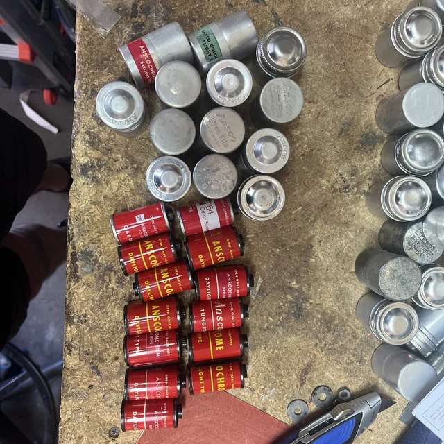 VINTAGE LOT 13 METAL TIN FILM CANISTER and LIDS and old FILM rolls. anscochrome