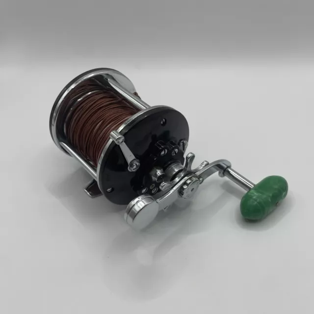 Vintage Fishing Spinning Reels , Includes , DAM Quick super from west  Berlin , Shakespeare Noris 2115 , Penn 710 , Mitchel 310 , 7 items -  Bunting Online Auctions