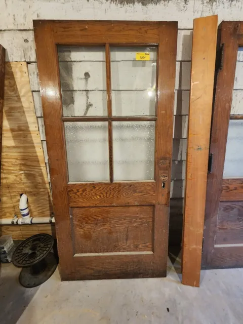 antique hardwood oak doors artistic glass circa 1940. Very heavy very solid