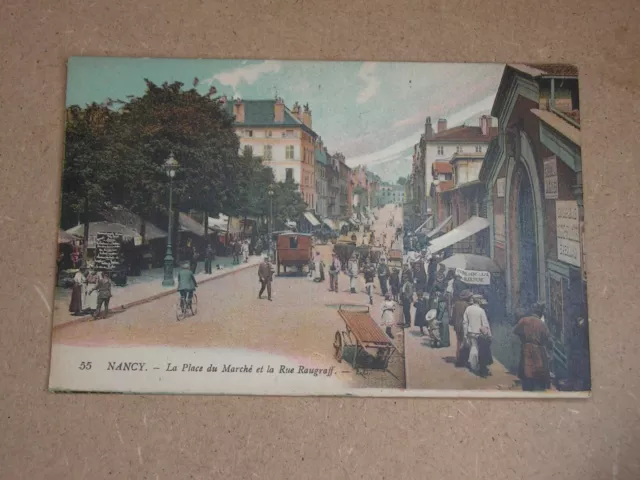 CPA - NANCY - La place du marché et la rue Raugraff