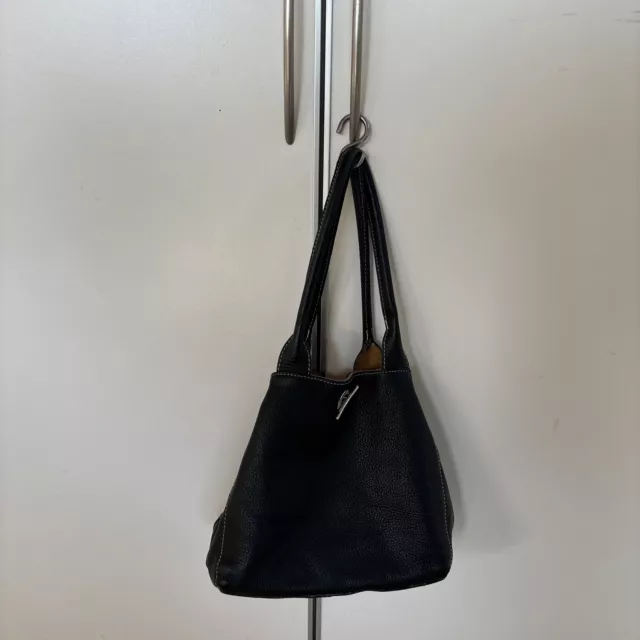 Hübsche kleine schwarze Handtasche, echtes Leder