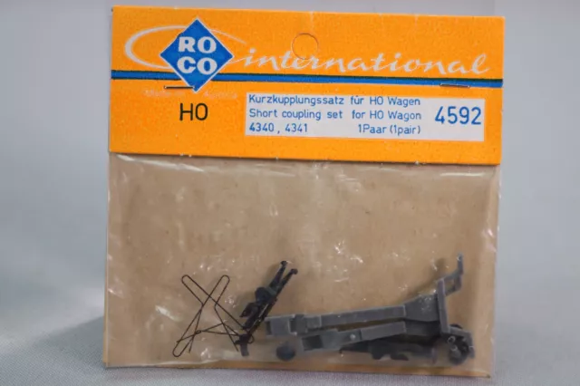 BA130 ROCO 4595 train Ho Sachet paire attelages courts Short coupling set