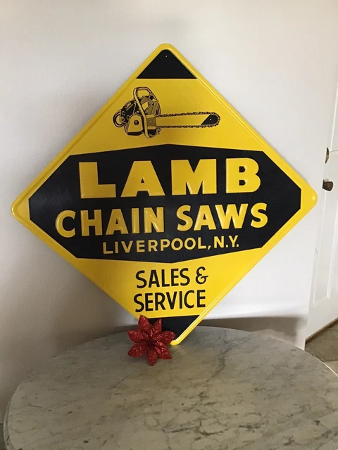 LAMB CHAIN SAW EMBOSSED MENTAL SIGN 1950’s