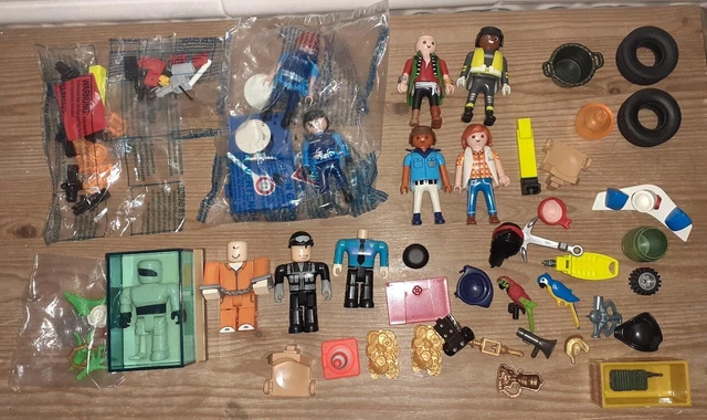 Bundle of assorted Playmobil and Roblox figures and mixed bits