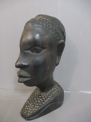 African art: tribal art, a wooden carved sculpture of young man, Africa,60's