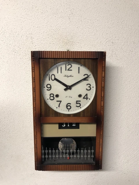 Antico orologio a pendolo Rhythm CON DATARIO A CORDA Cassa In Legno  Con Chiave
