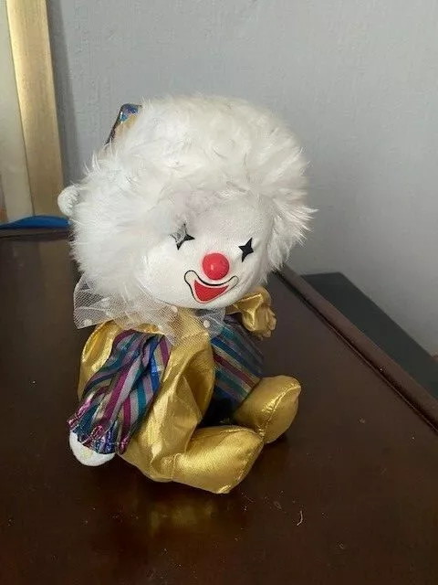 Musical clown sales doll