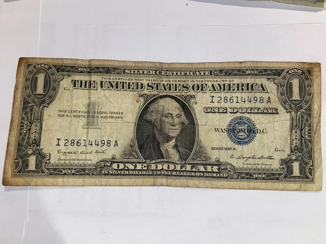 1957 A * Note * One Dollar Silver Certificate Blue Seal. Well Circulated.