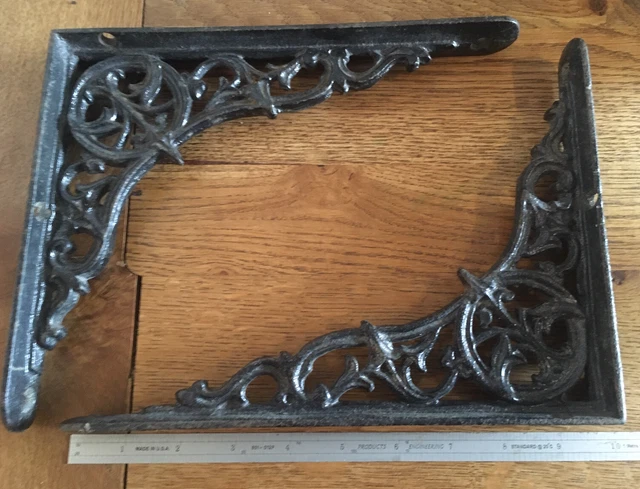 A pair of Victorian shelf or cistern brackets cast iron 10”x8” approx Ironwork