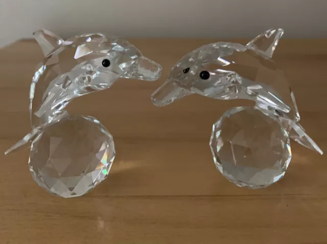 Glass dolphin ornaments