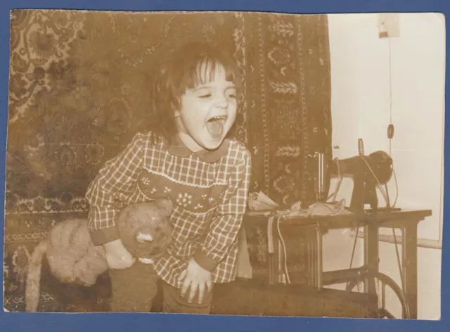 Beautiful Child with a toy screams, Sweet Baby Soviet Vintage Photo USSR