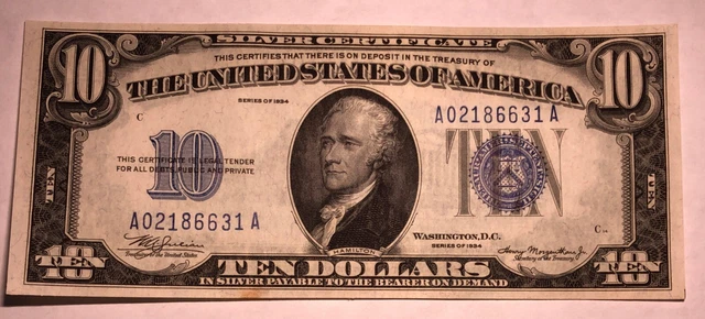 1934 $10 blue seal silver certificate FR1701. CU. small reverse stain. #ad129