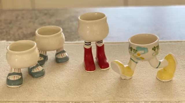 4 Carlton 'walking' Ware Egg Cups inc Caribbean, red wellies & blue stripes