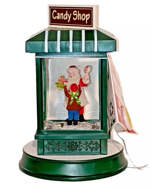 Linterna de agua Santa's Candy Shop luz LED globo de nieve remolino brillo piruleta