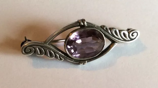Small antique Art Nouveau silver brooch, set with amethyst