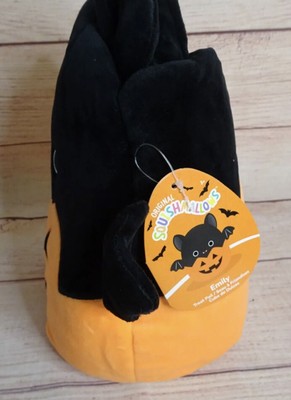 emily in a pumpkin squishmallow
