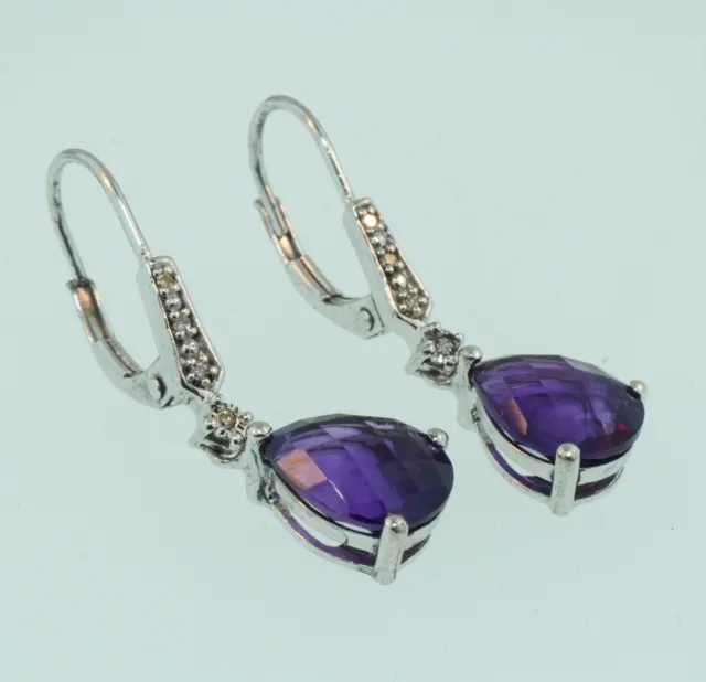 925 Sterling Silver Earrings with Amethyst and natural Diamonds.