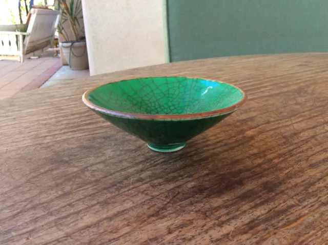 a Chinese apple green crackle glaze tea bowl of conical shape, Ming - middl Qing