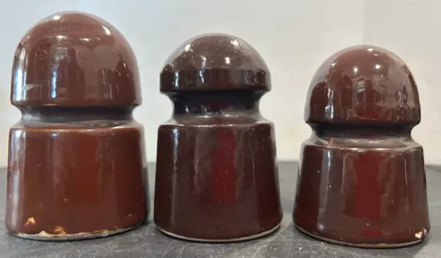 RR 3 Unmarked brown porcelain insulator approx. 3.5", 3.25" and 3" tall