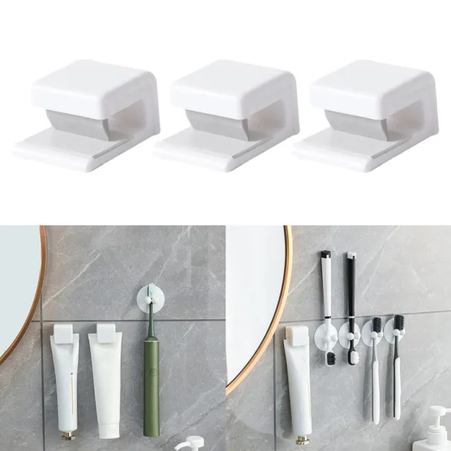 Elegante organizador de pasta de dientes adhesiva montaje en pared para organización en el hogar
