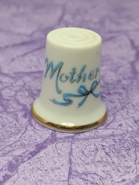 Vintage Thimble White Bone China, says  "Mother" with blue bow Gold Trim Gift