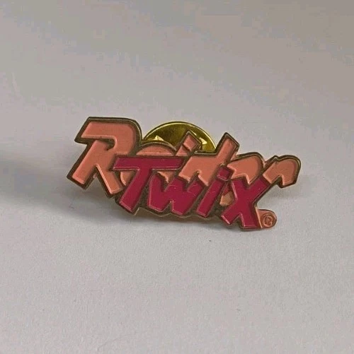 Pin's publicitaire ancien Raider chocolat vintage collection rétro