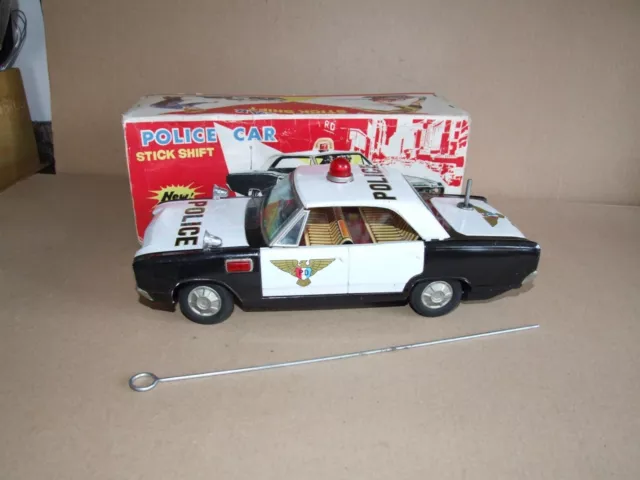 T.N.  Nomura Stick Shift Police Car