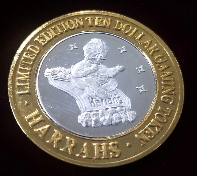 .999 $10 Silver Strike | Gambling Token | Harrah's | Reno | Genie w/ bottle