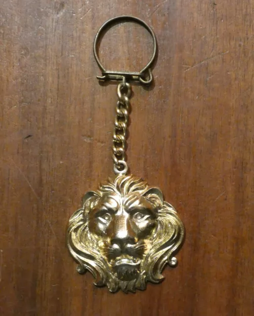 ancien porte clé métal doré tête de lion années 60