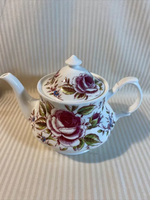 https://www.picclickimg.com/5g0AAOSw1qhj-lqD/ROSE-Fine-Bone-China-Teapot-from-Roy-Kirkham.webp