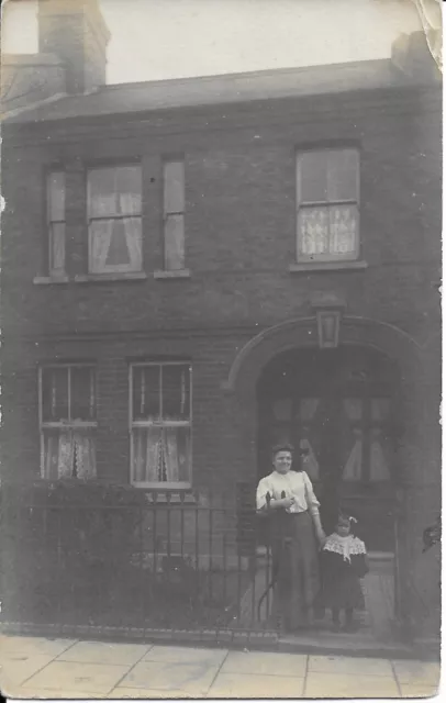 Unknown Location - Real Photo Postcard of Mother & Daughter at front of House