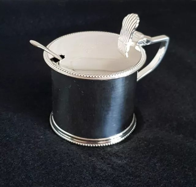 Antique sterling silver mustard pot & spoon.London 1892. By William Hutton & Son