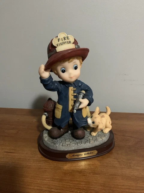 Montefiori Collection Little Firefighter with Puppy Dog
