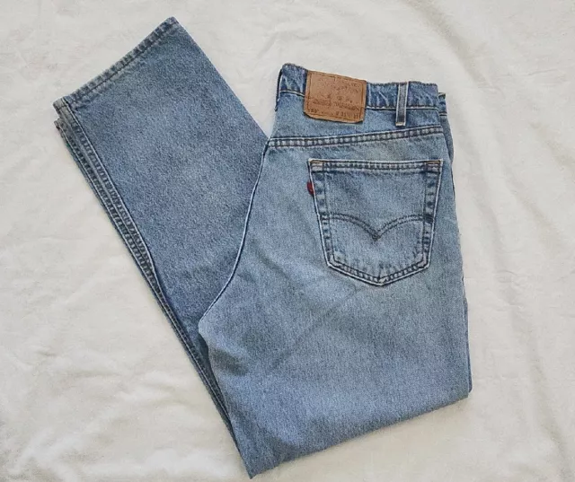 Vintage 90s Levis 550 Relaxed Fit Jeans 36x31  Distressed Light Wash Made In USA