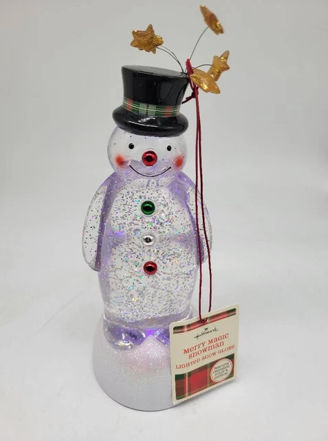 2009 HALLMARK Merry Magic Swirling globo de nieve cambio de color remolinos etiqueta muñeco de nieve