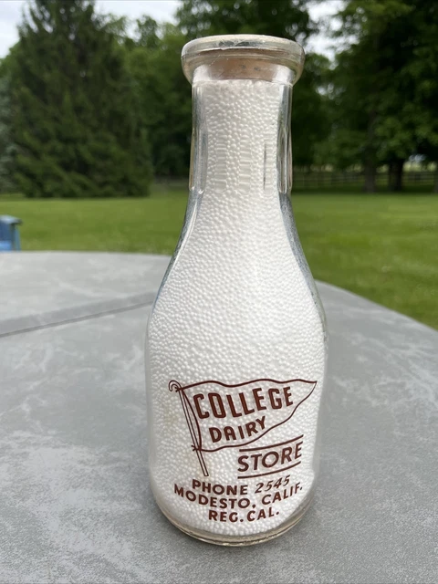 COLlEGE DAIRY STORE Modesto Ca. MILK BOTTLE Qt War Bonds Burg Pyro Nice!